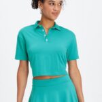 Fabletics cerceta escura 420HR2003 polo de manga curta boxy mulheres